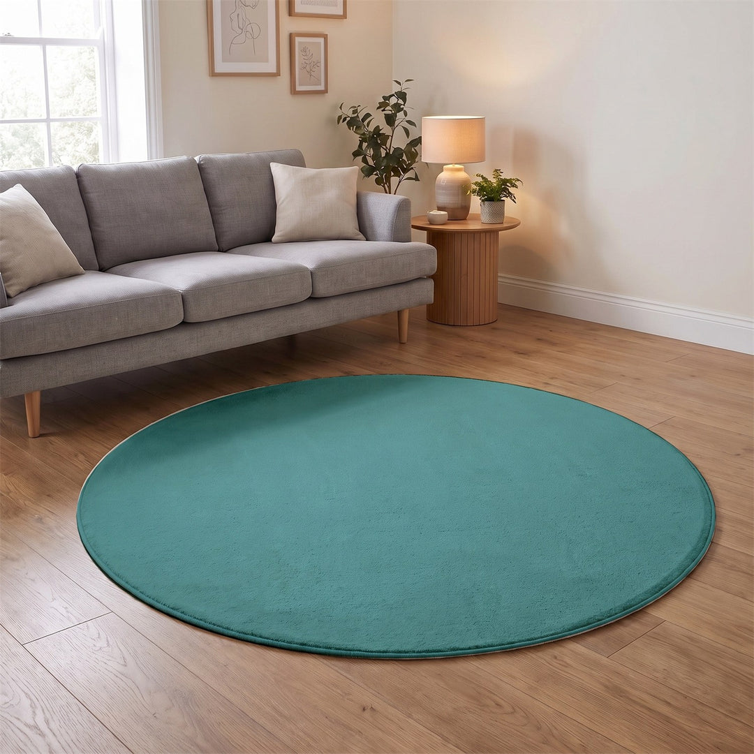 Washmellow duck egg blue round washable rug in a living room | The Rugs