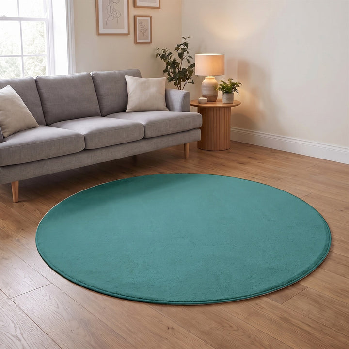 Washmellow duck egg blue round washable rug in a living room | The Rugs