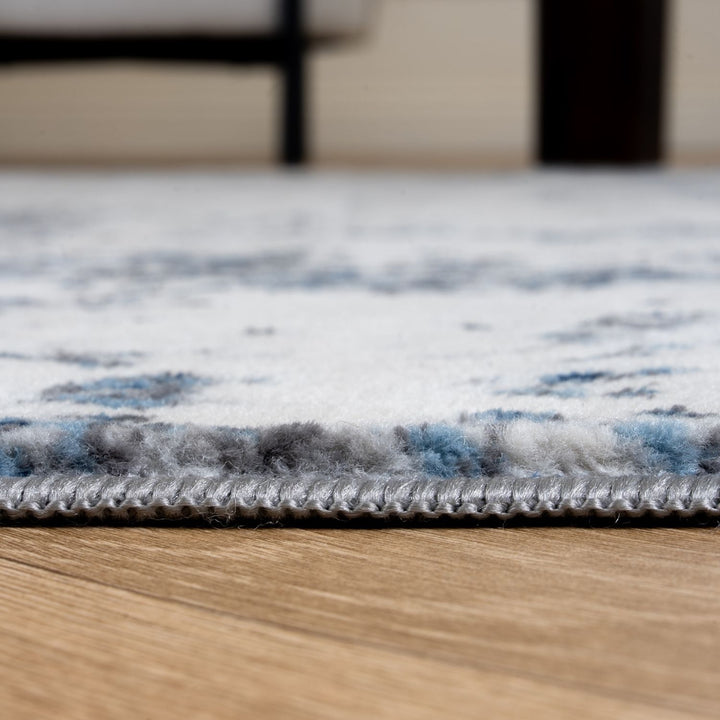 Elaris navy abstract rug, jute backing, hardwearing, polypropylene material | The Rugs