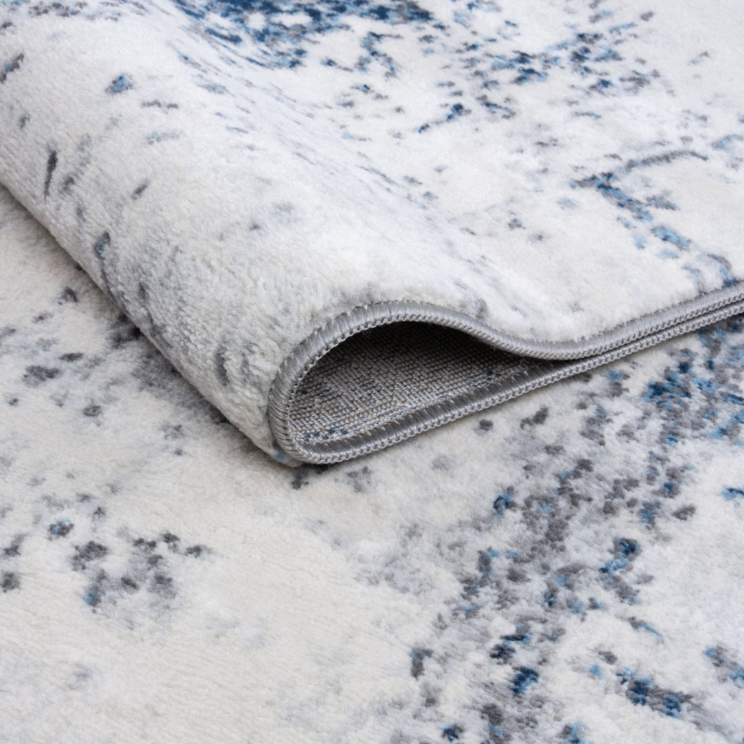 Elaris navy abstract rug, jute backing, hardwearing, polypropylene material | The Rugs