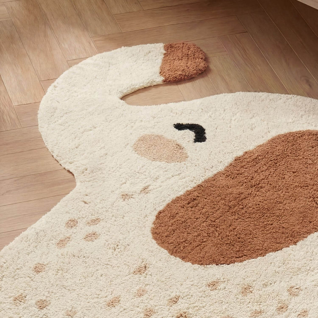 Dog-shaped rug on a wooden floor