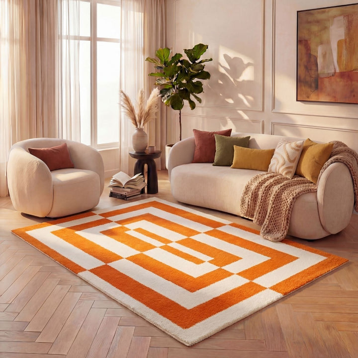 Orange and white geometric patterned rug