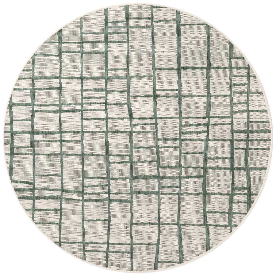Round rug with green line pattern on a white background