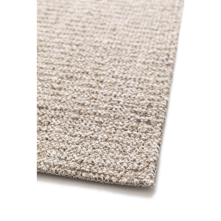 Dune Boucle greige textured rug, close-up of the bound edge | The Rugs