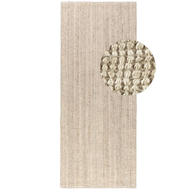 Textured beige rug with a circular textured mat on a white background