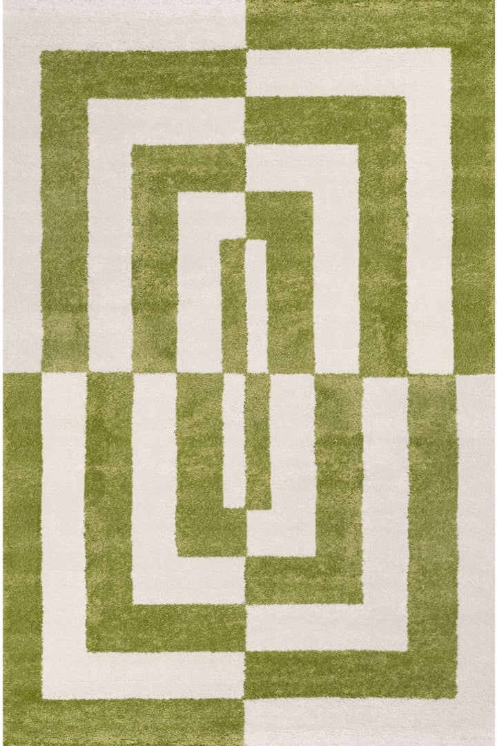 Green and white geometric patterned rug