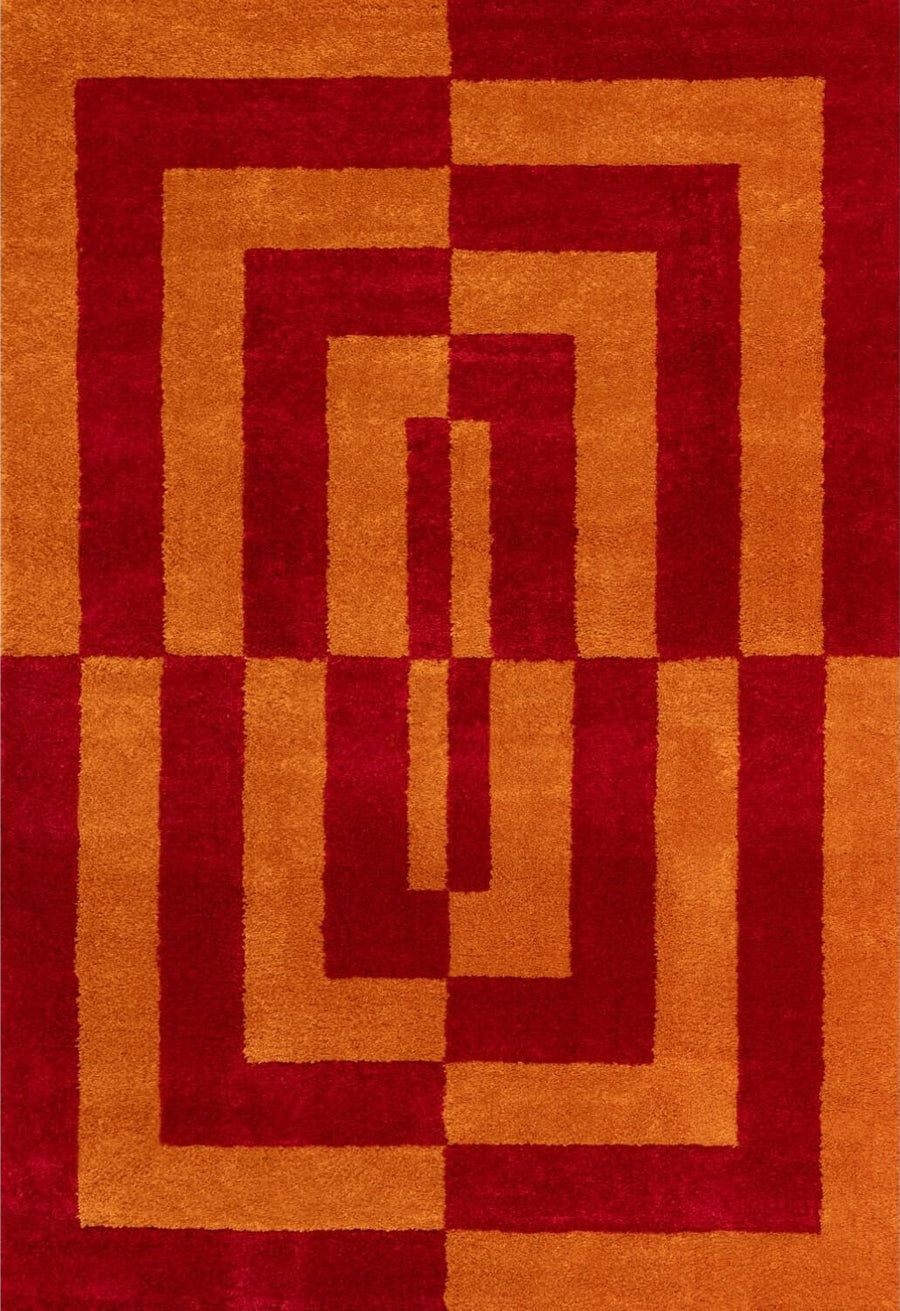 Red and orange geometric patterned rug