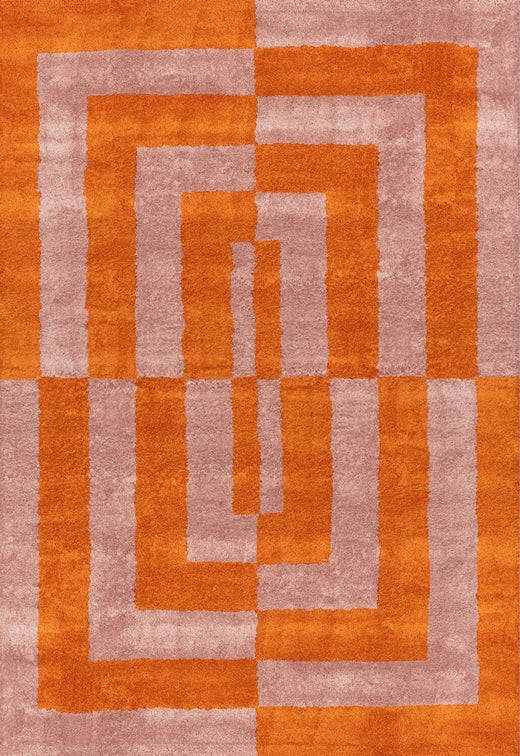 Geometric patterned rug with orange and beige colours