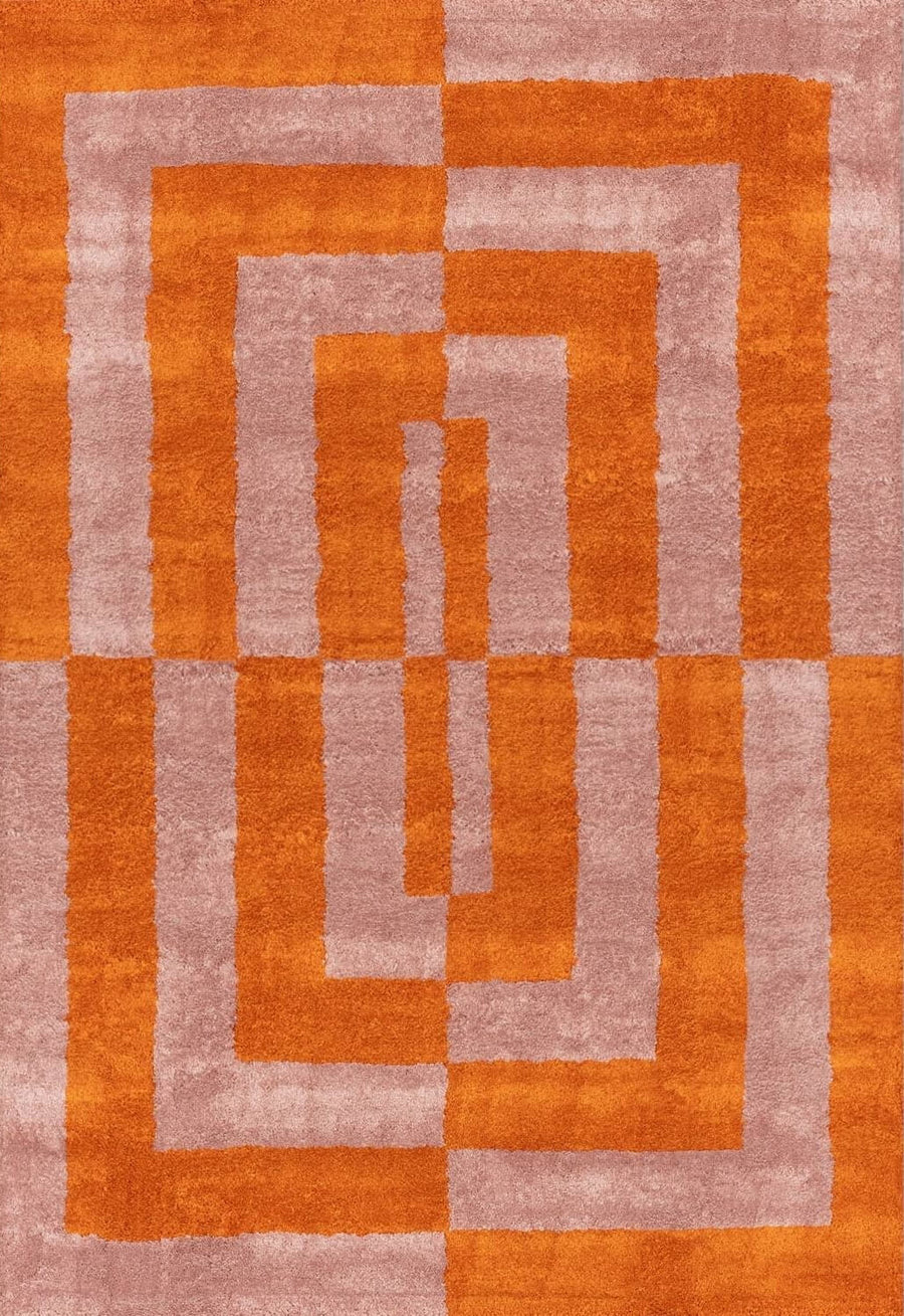 Geometric patterned rug with orange and beige colors