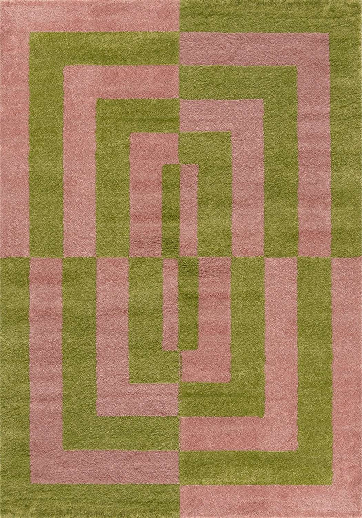 Geometric patterned rug with pink and green colors