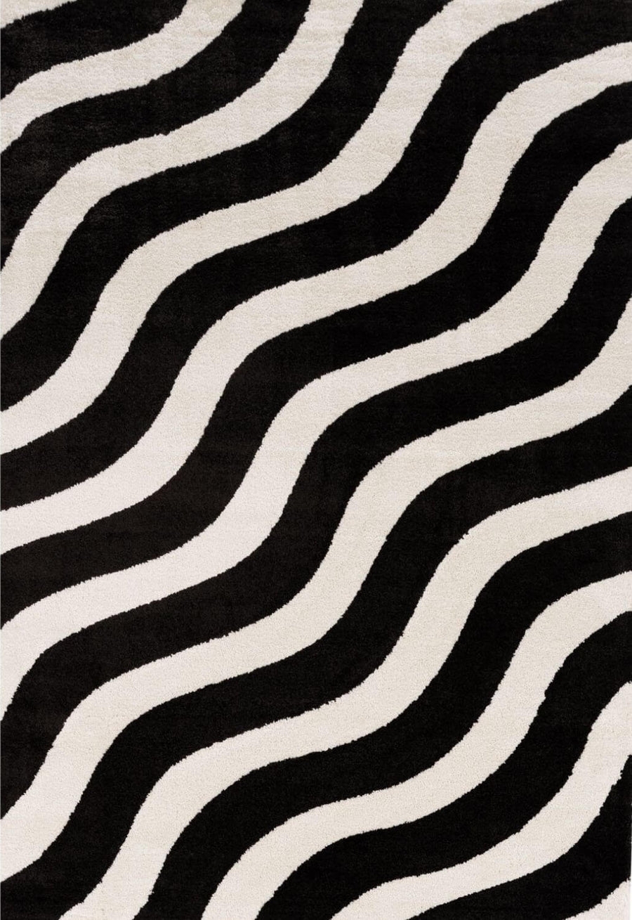 Black and white wavy patterned rug