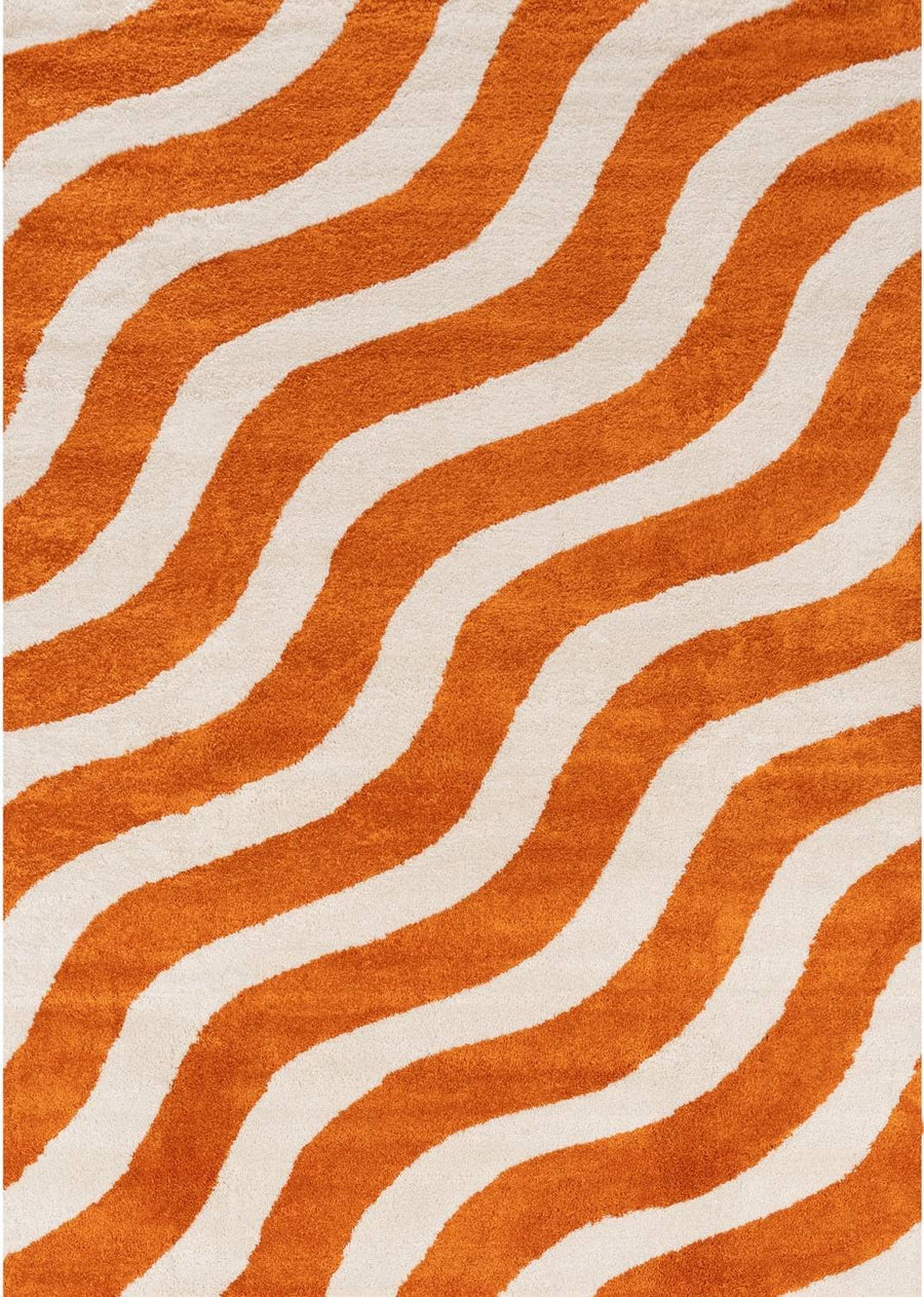 Rug with orange and white wavy pattern