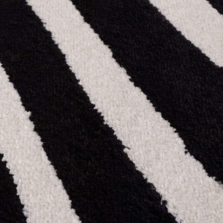Close-up of black and white striped fabric texture