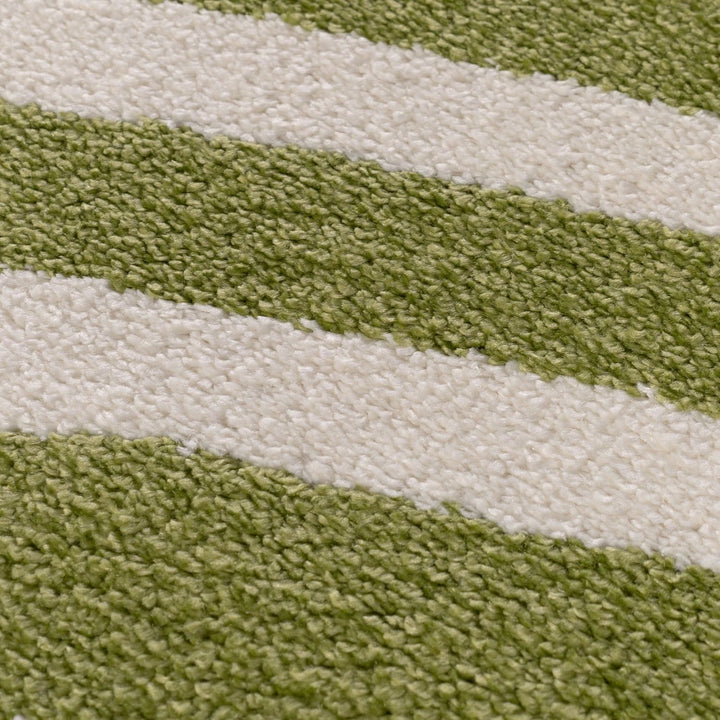Close-up of green and white striped fabric texture