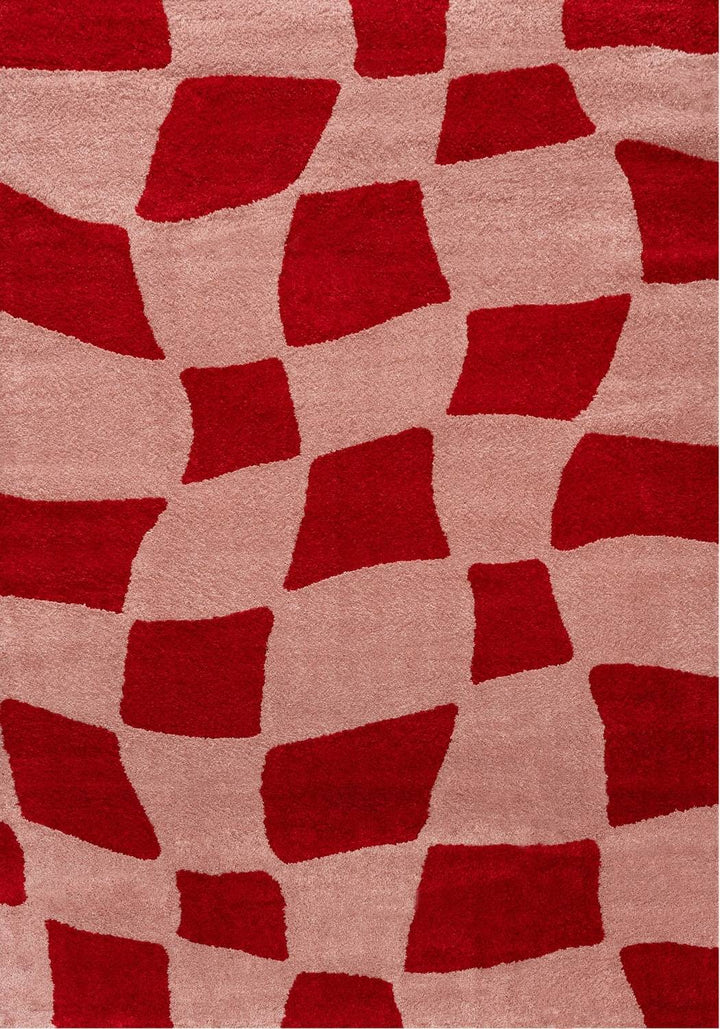 Red and beige patterned rug with geometric shapes
