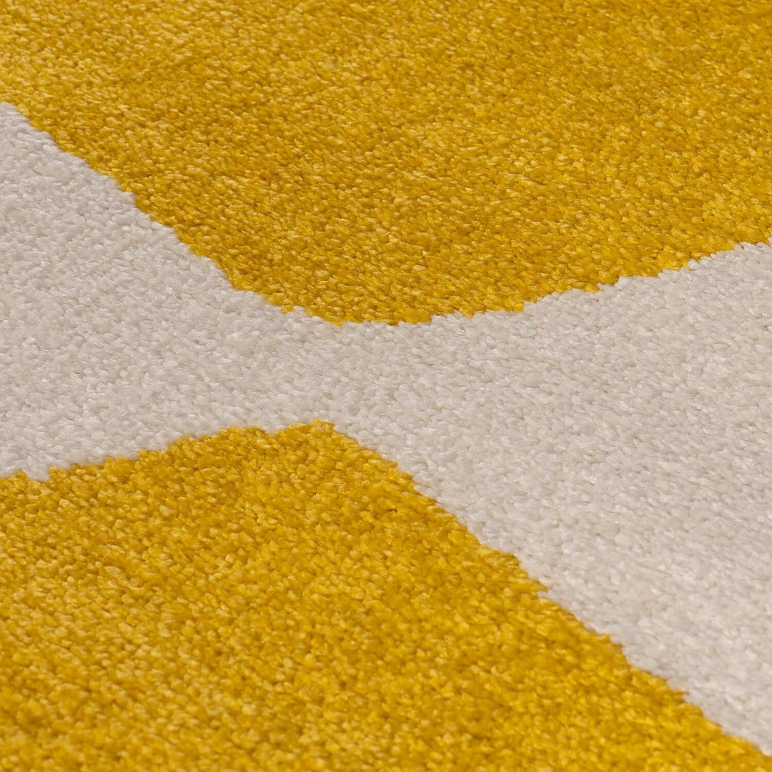 Close-up of a textured yellow and beige rug