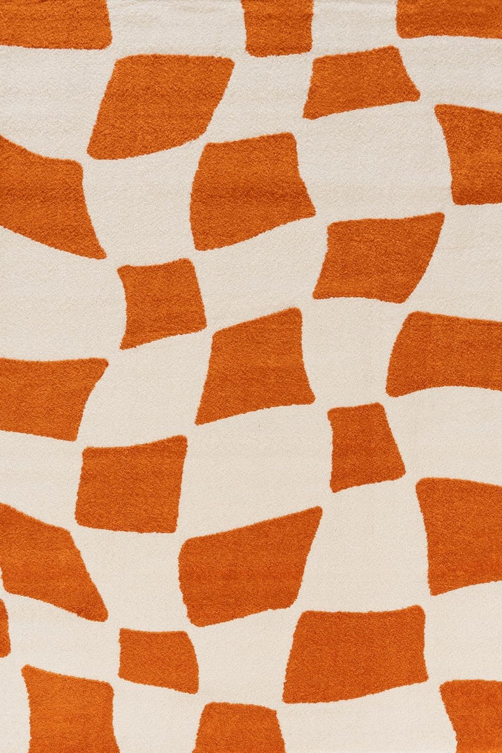 Patterned orange and beige fabric texture