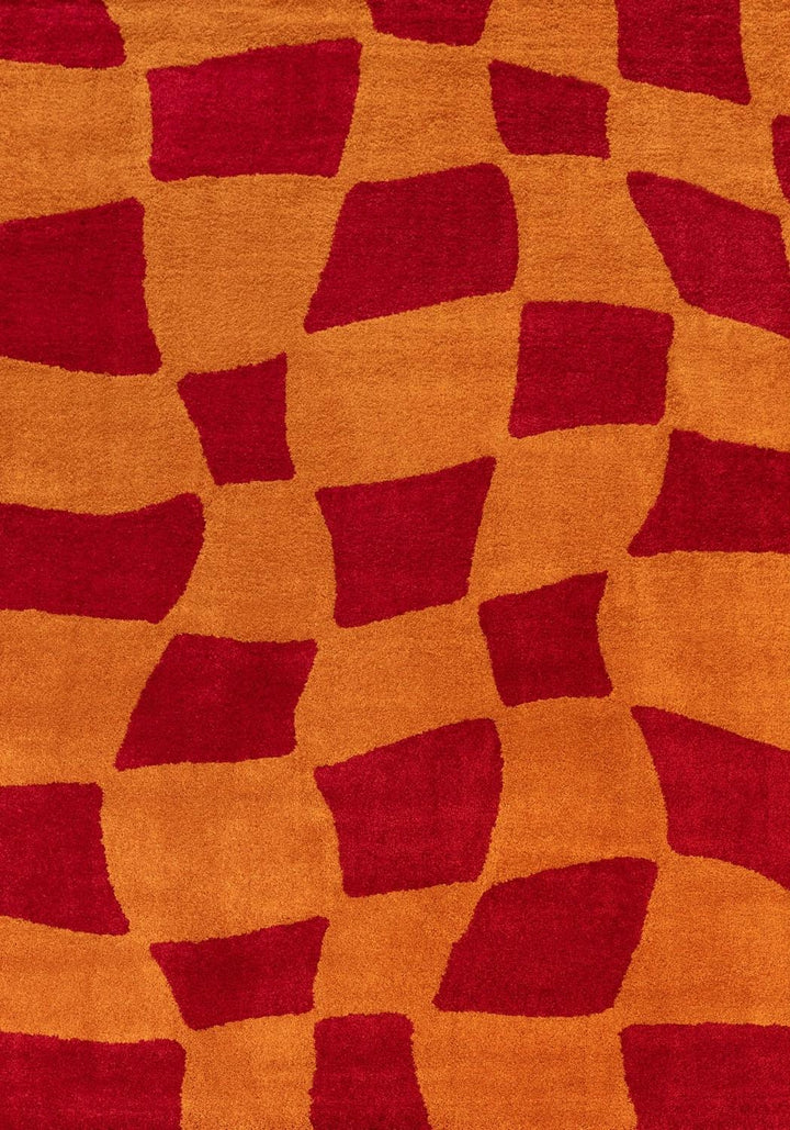 Patterned fabric with red and orange geometric shapes