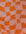 Patterned fabric with orange geometric shapes on a pink background