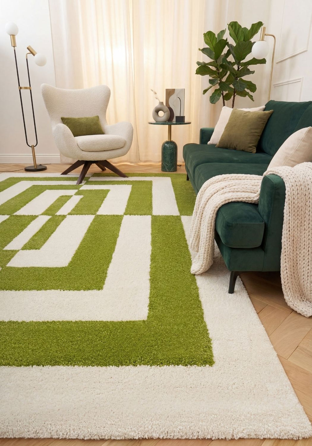 Living room with a green and white checkered rug, green sofa, and white armchair.