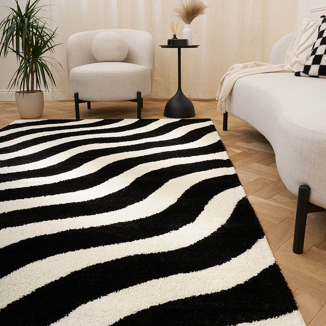 Black and white wavy patterned rug