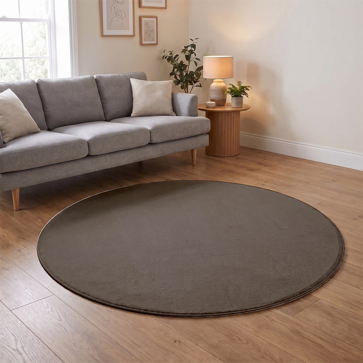 Washmellow light brown round washable rug in a living room | The Rugs