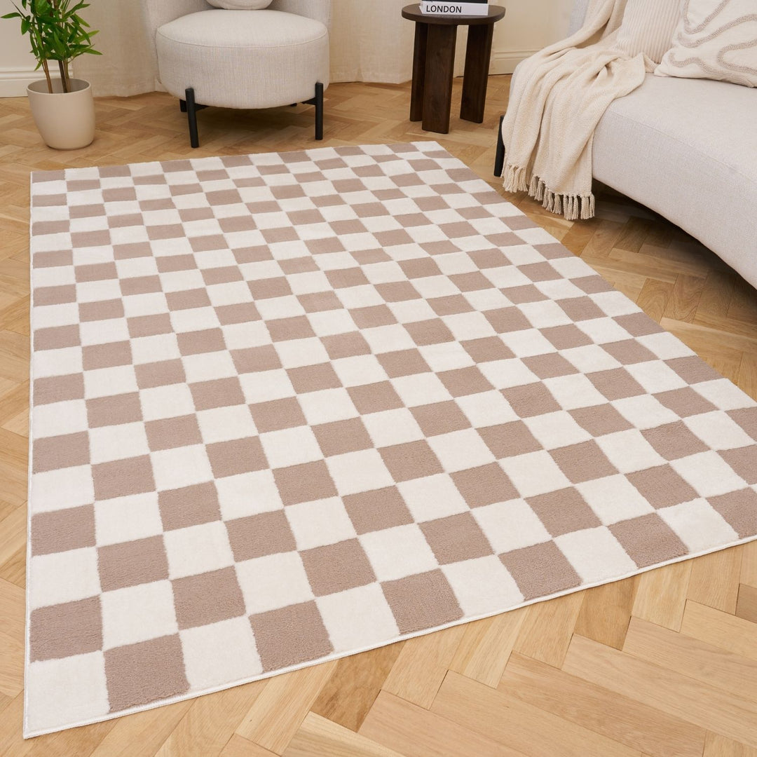 Checkered rug with brown and white squares on a wooden floor