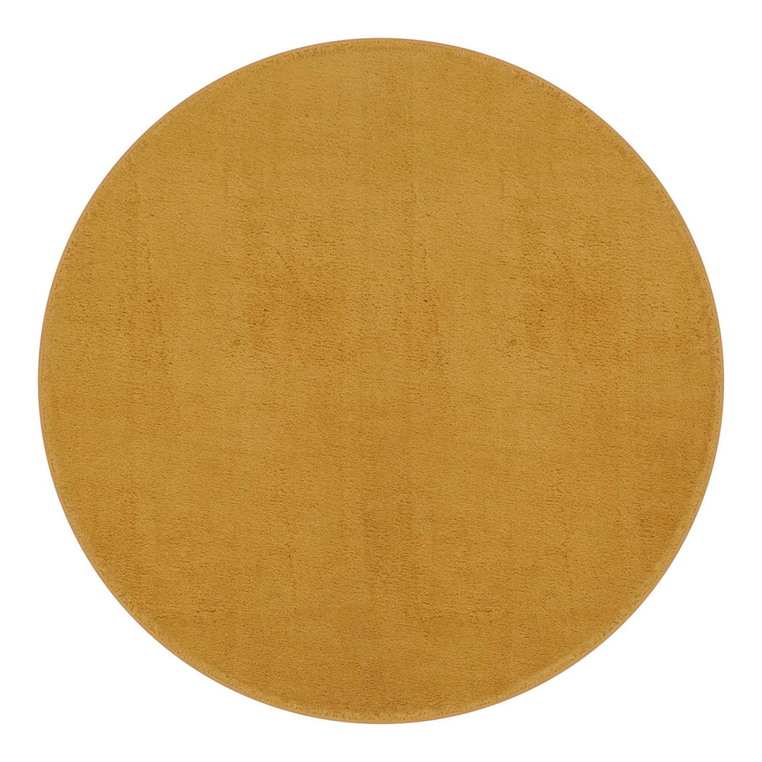 Washmellow ochre round washable rug, top view | The Rugs