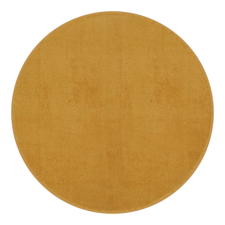 Washmellow ochre round washable rug, top view | The Rugs