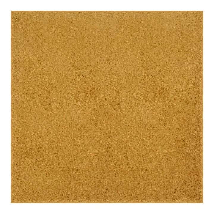 Washmellow ochre square washable rug, top view | The Rugs