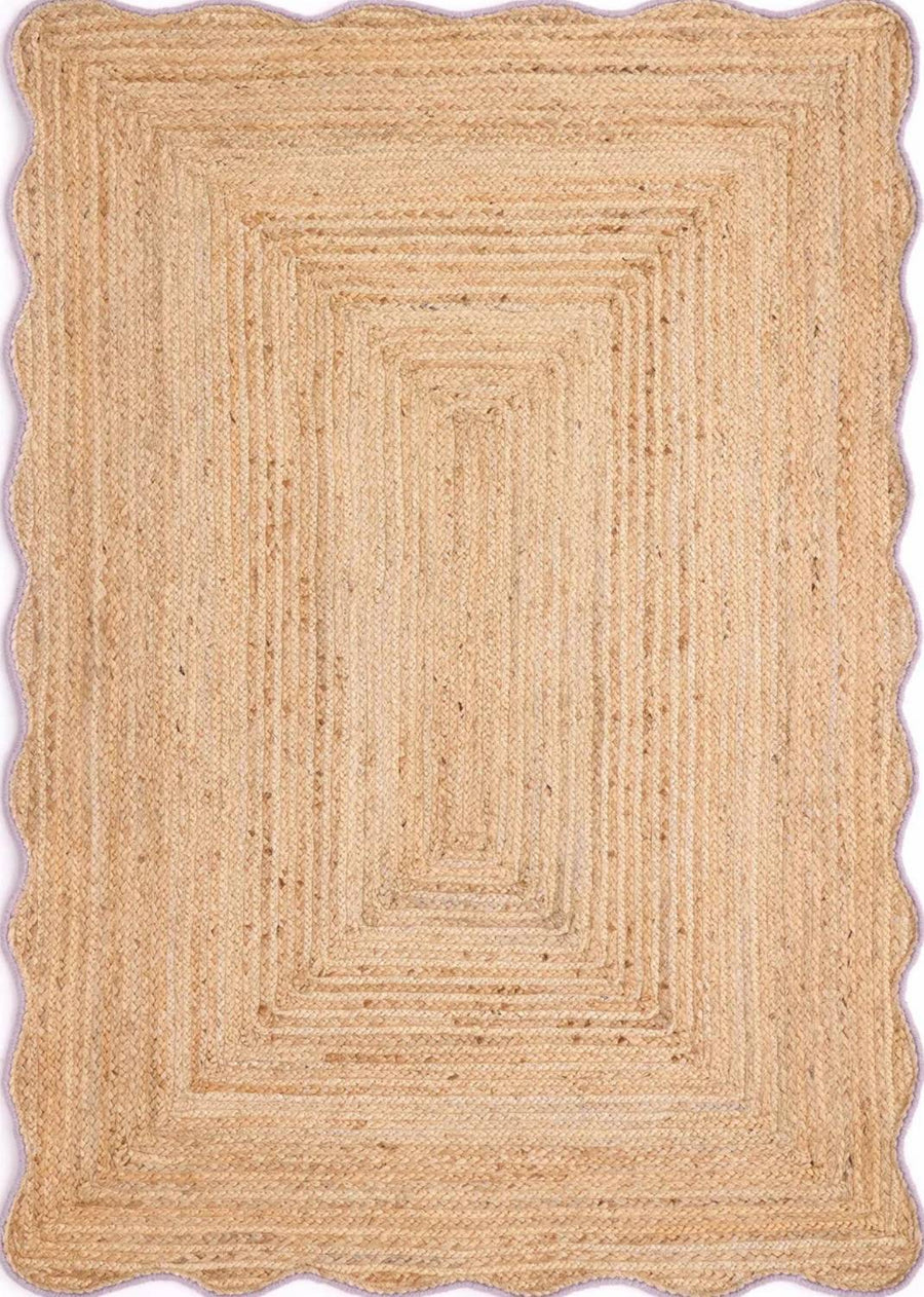Beige braided rug with a rectangular pattern on a plain background