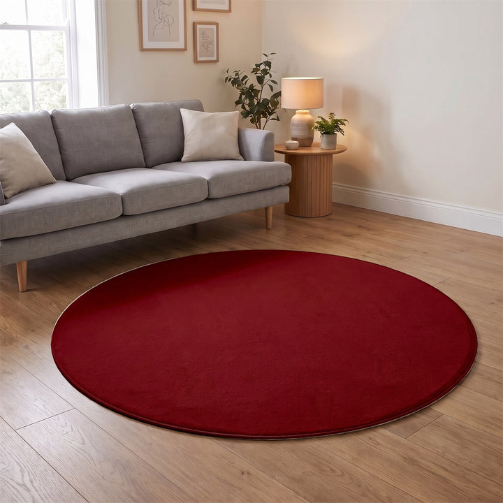 Washmellow red round washable rug in a living room | The Rugs