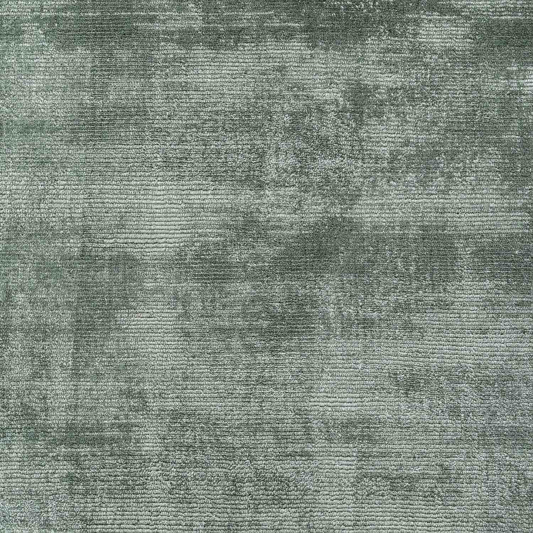 Textured green fabric pattern