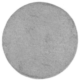Round gray rug on a white background