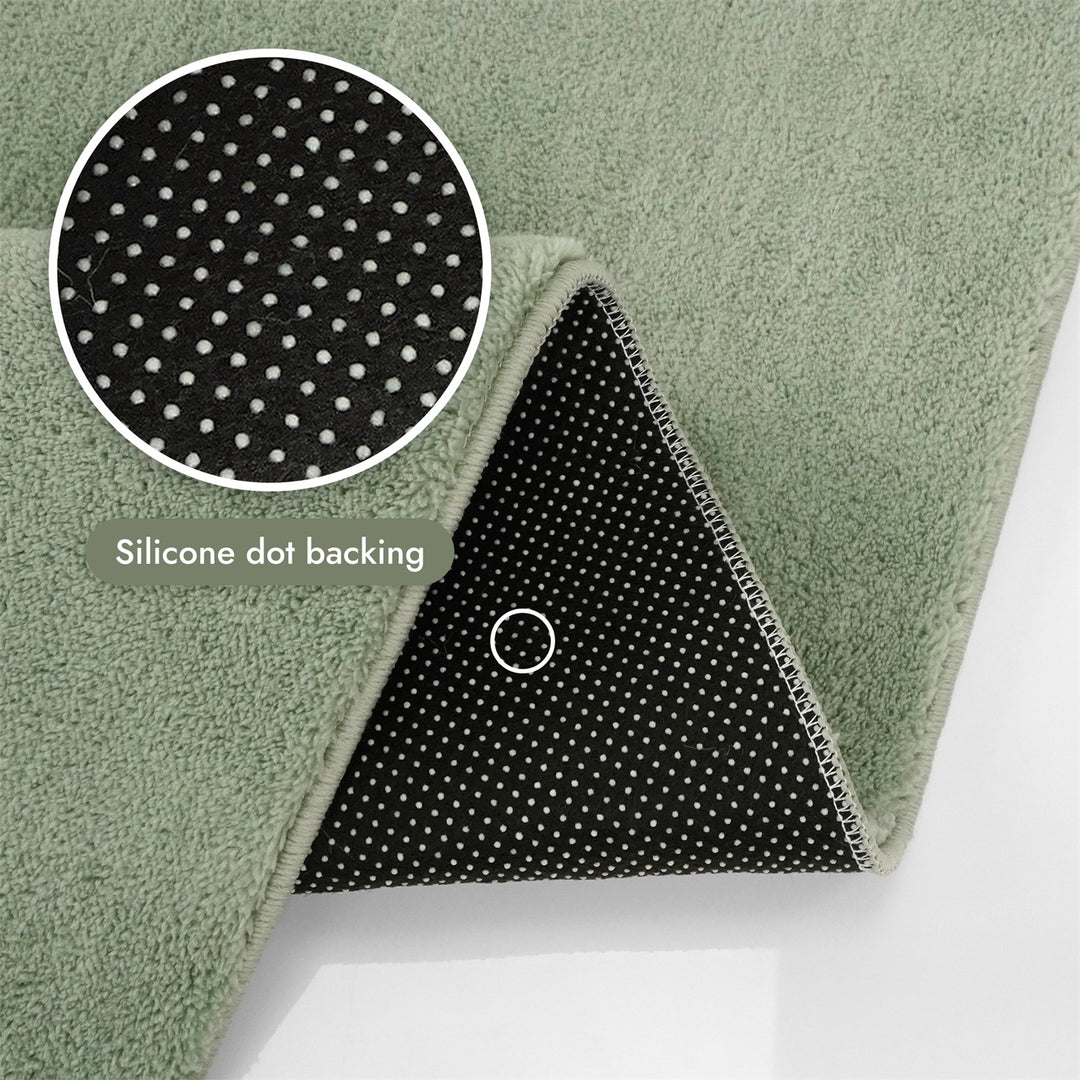 Washmellow sage green washable rug, silicone dot backing that grips hard floors | The Rugs
