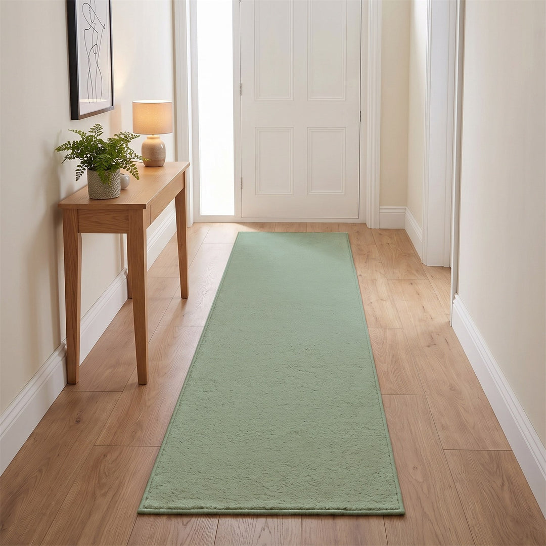 Washmellow sage green washable runner in a hallway | The Rugs