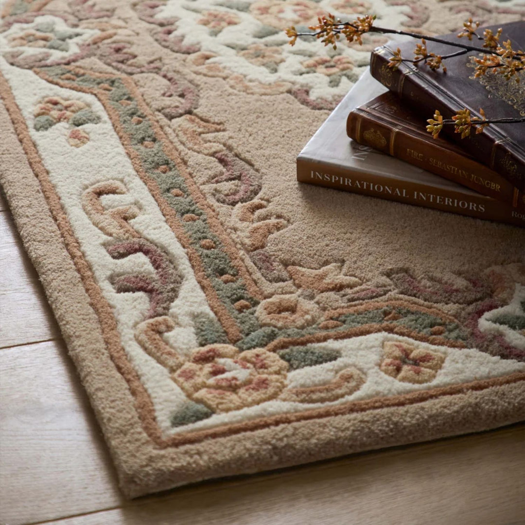 Decorative rug with intricate patterns on a wooden floor