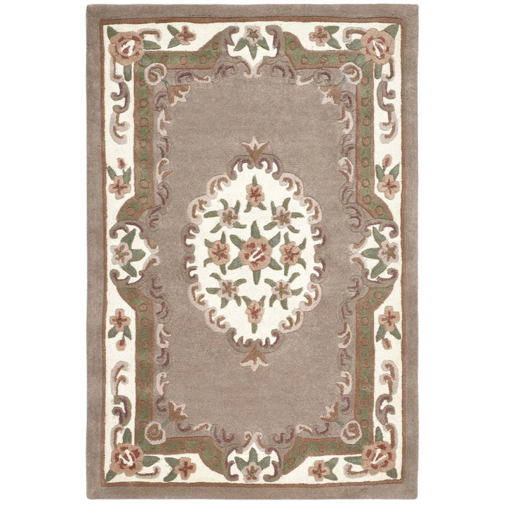 Decorative rug with floral pattern and border on a plain background