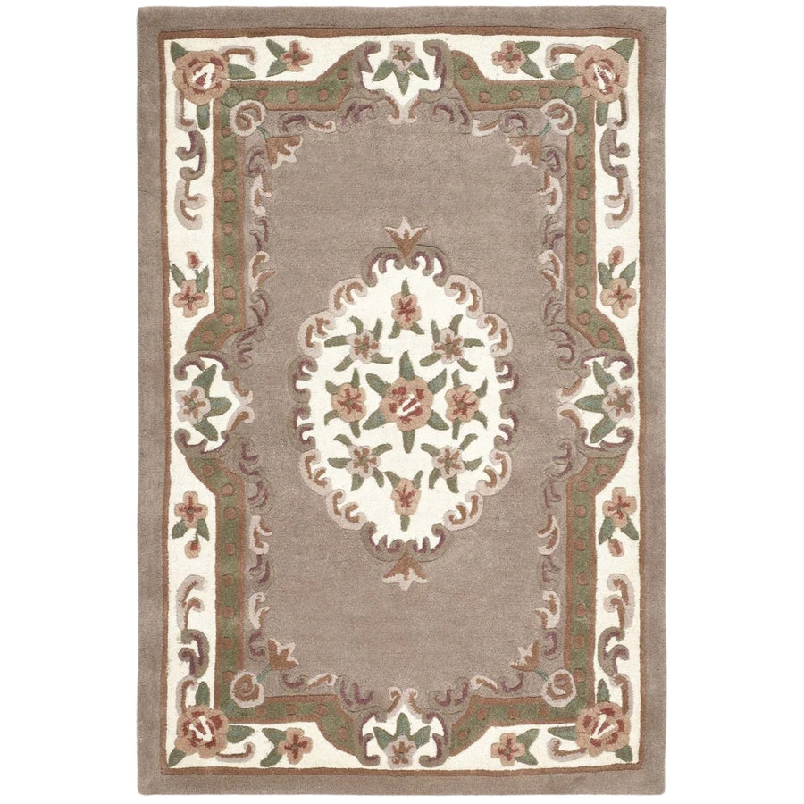 Decorative rug with floral pattern and border on a plain background