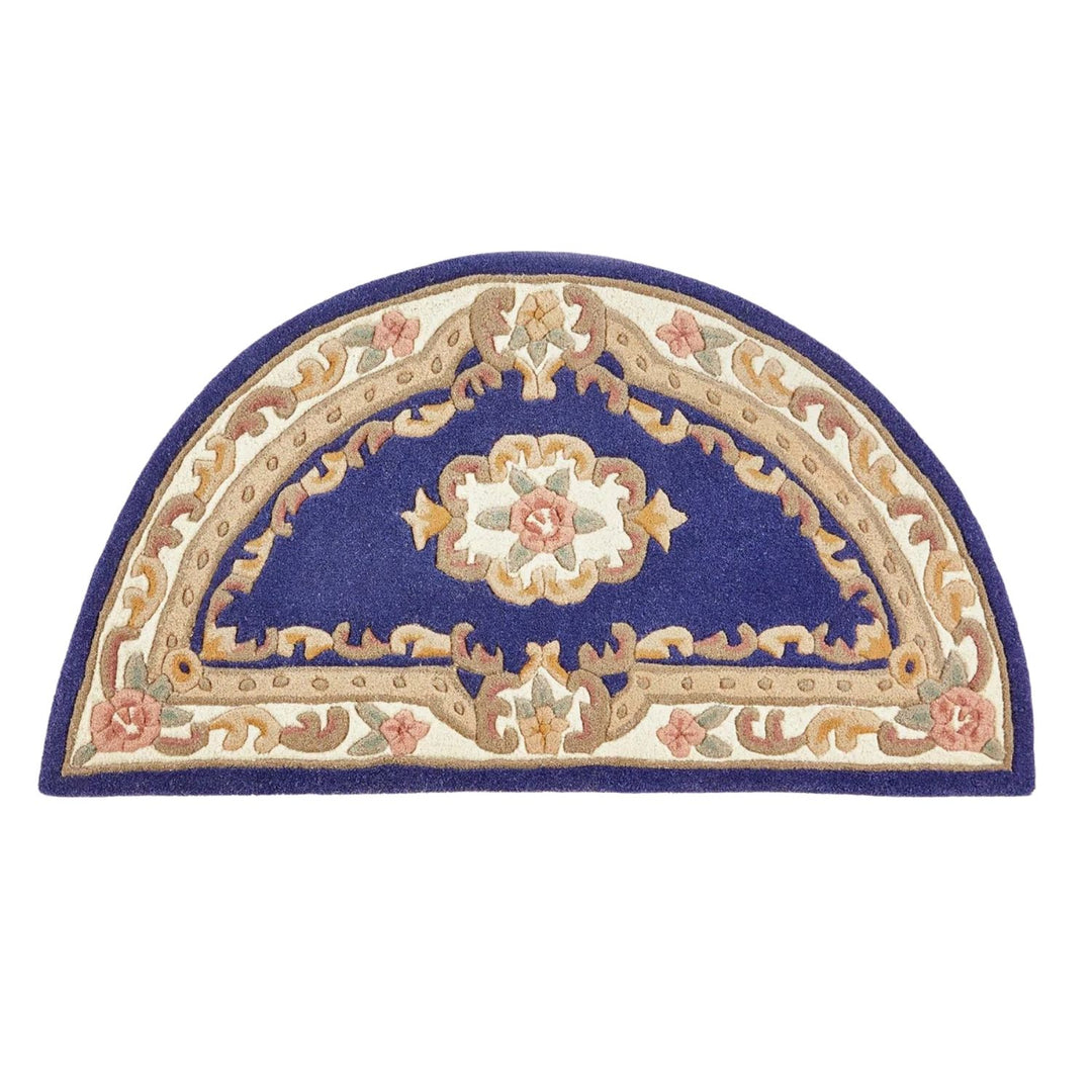 Decorative half-moon rug with floral and geometric patterns on a white background