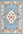 Decorative rug with floral pattern and intricate border on a light blue background