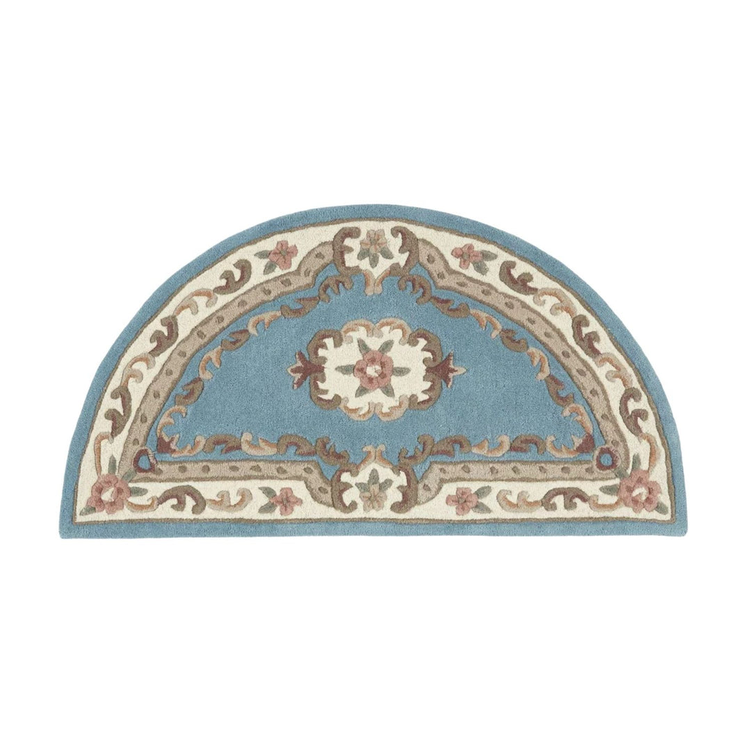 Decorative half-circle rug with floral patterns on a white background