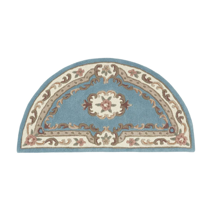 Decorative half-circle rug with floral patterns on a white background