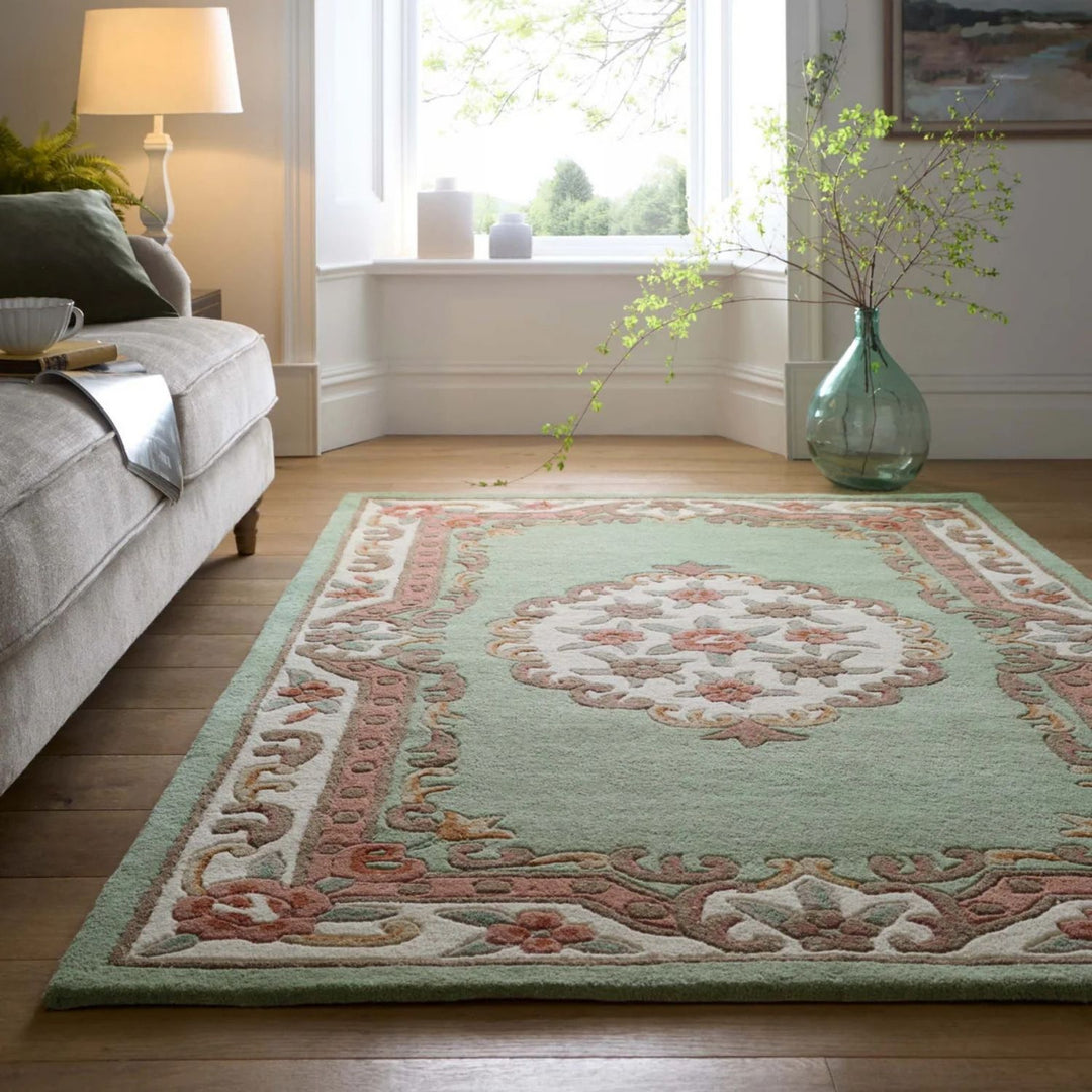 Decorative rug with intricate patterns in a living room setting.
