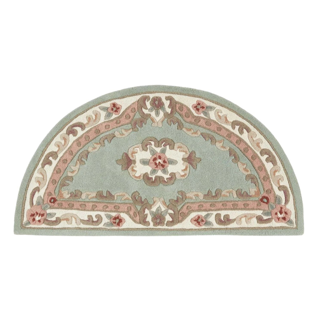 Decorative half-circle rug with floral patterns on a white background