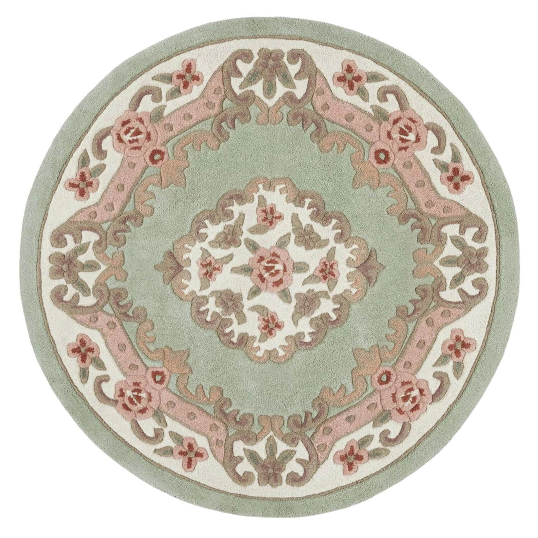 Round decorative rug with floral patterns on a light green background