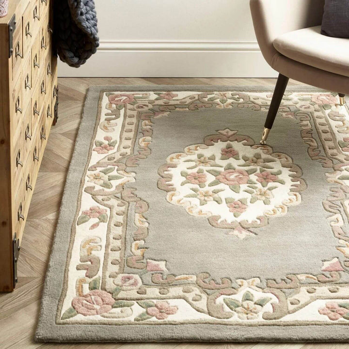 Decorative rug with floral patterns on a wooden floor