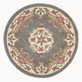 Round decorative rug with floral patterns on a white background