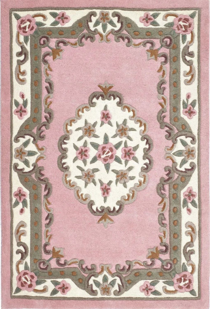 Decorative rug with floral patterns on a pink background