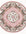 Round pink rug with floral patterns on a white background